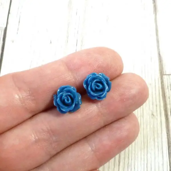 Blue Rose Studs on Hand